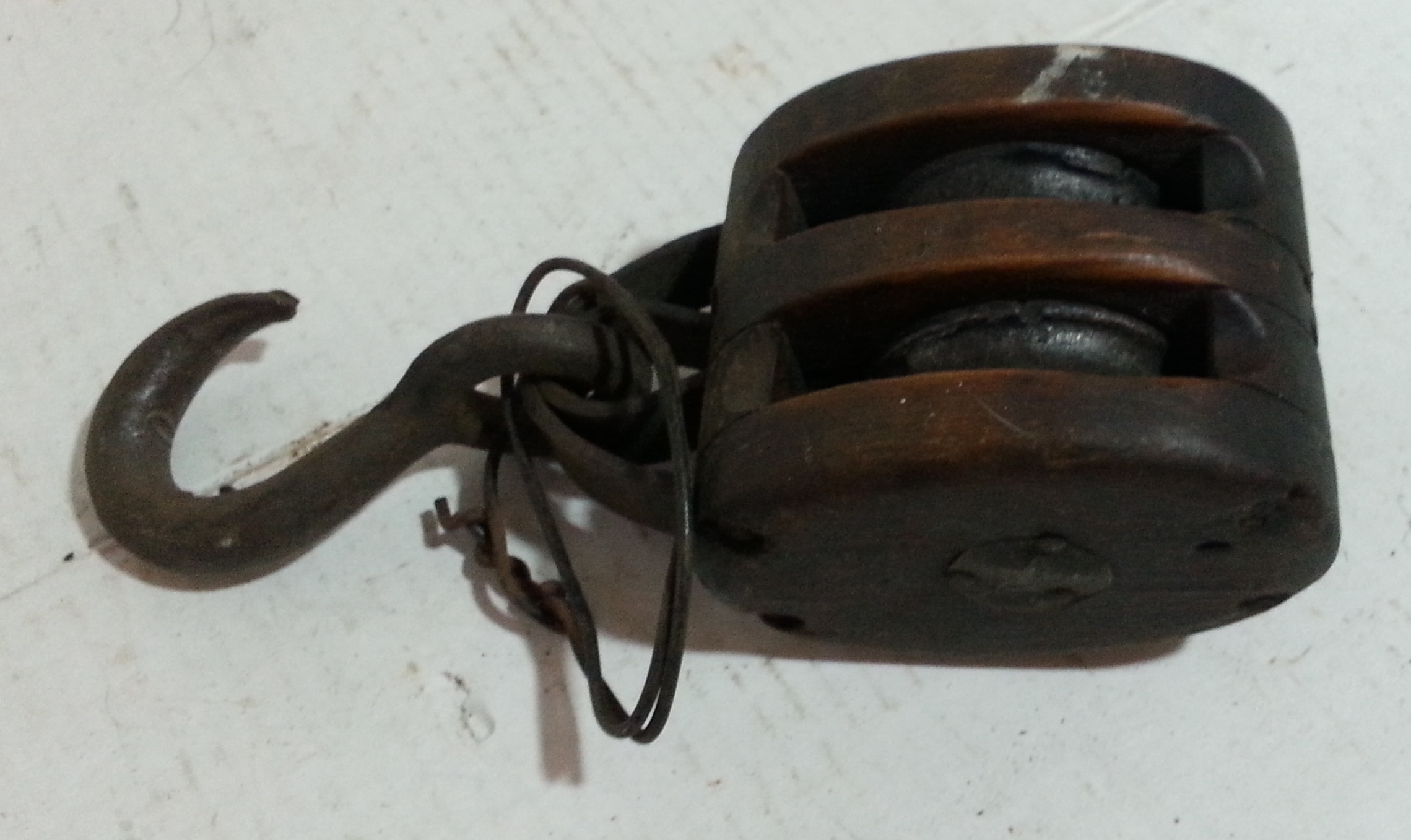 antique wood pulley with hook